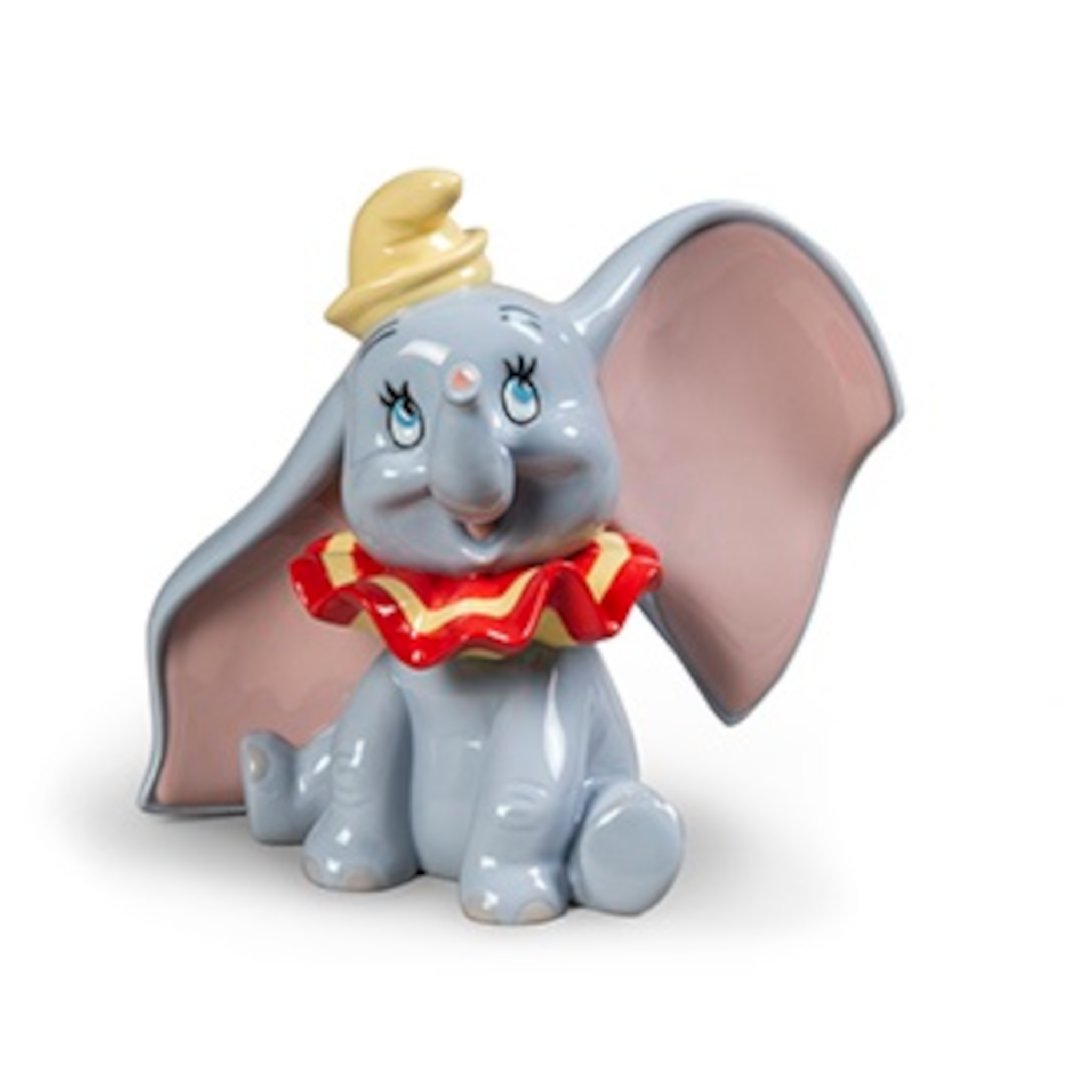 Hochwertige Porzellanfigur von Dumbo mit großen Ohren und fröhlichem Ausdruck.