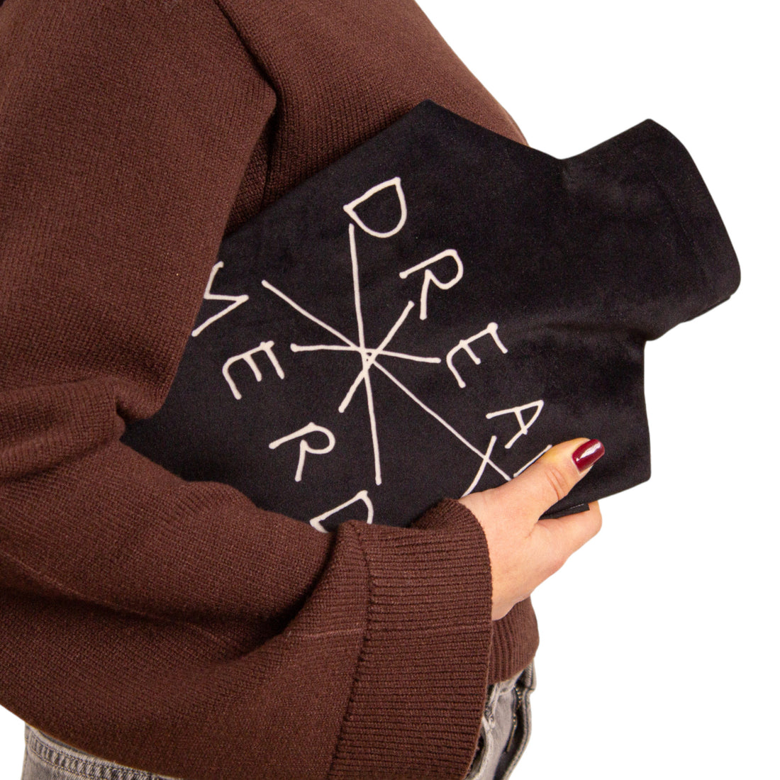 Seletti Wärmflasche mit humorvollem Schriftzug „DREAM MERDA“