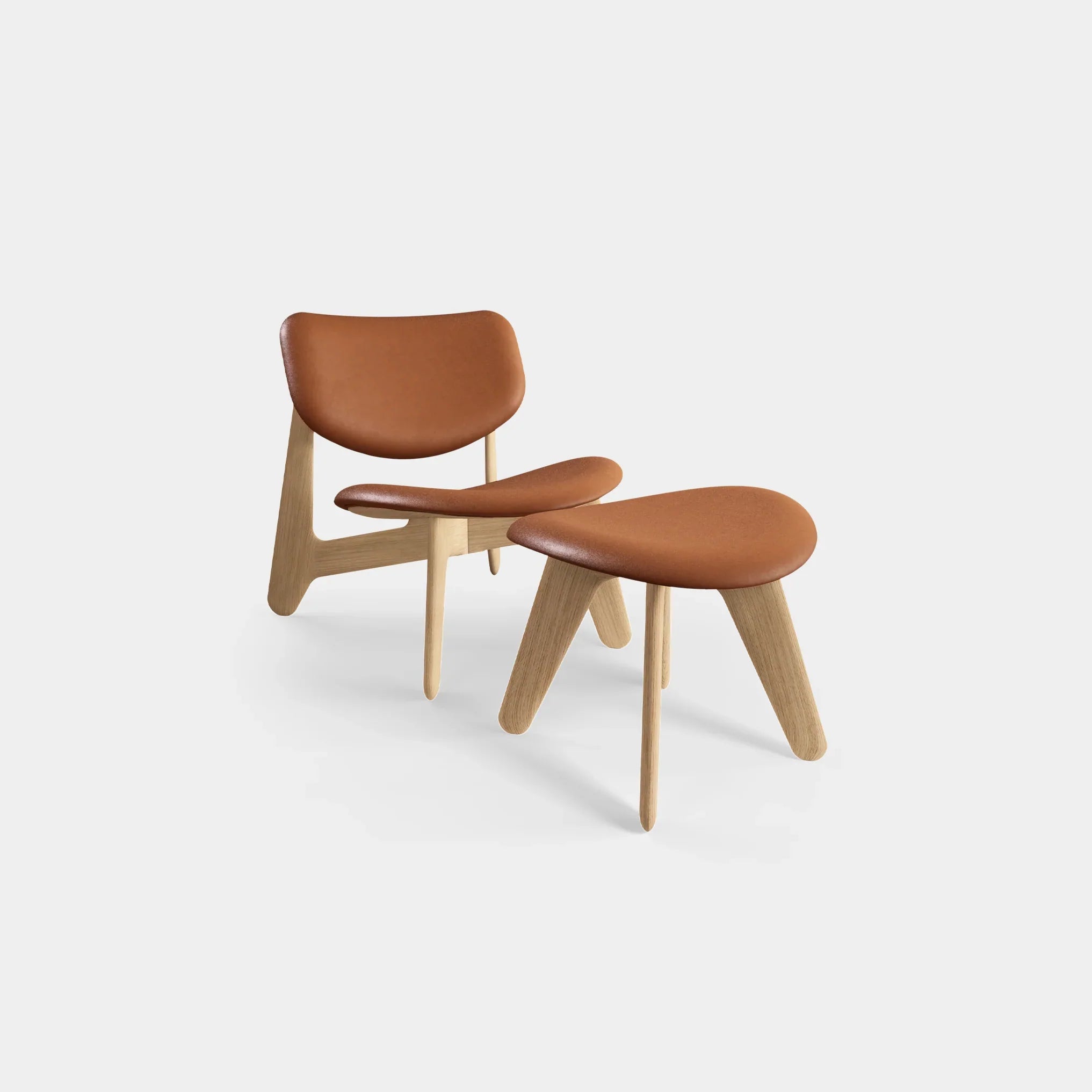 Minimalistischer Slab Lounge Sessel von Tom Dixon aus Holz und Leder, klare Linien und natürliche Materialien im Interior Design