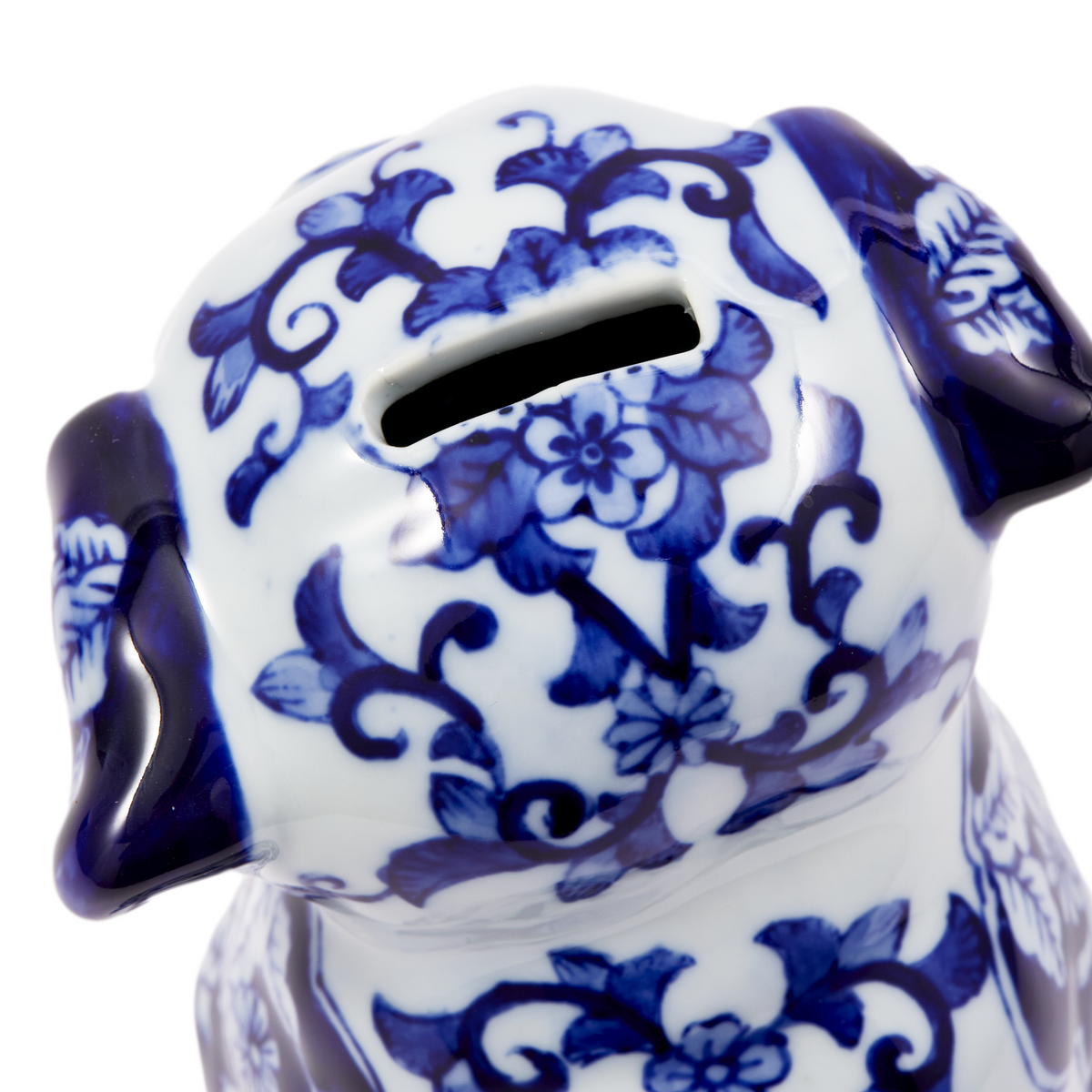 Nahaufnahme der PUPPY PIGGY BANK mit goldenen Details