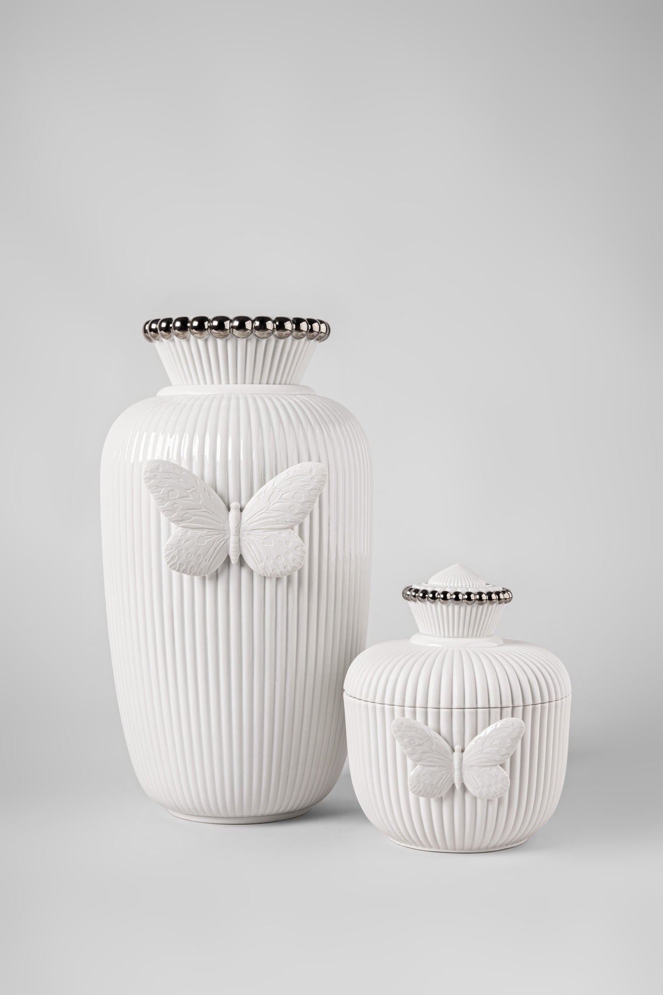 Schmetterlingssymbol als zentrales Gestaltungselement der LADY LUCK Vase