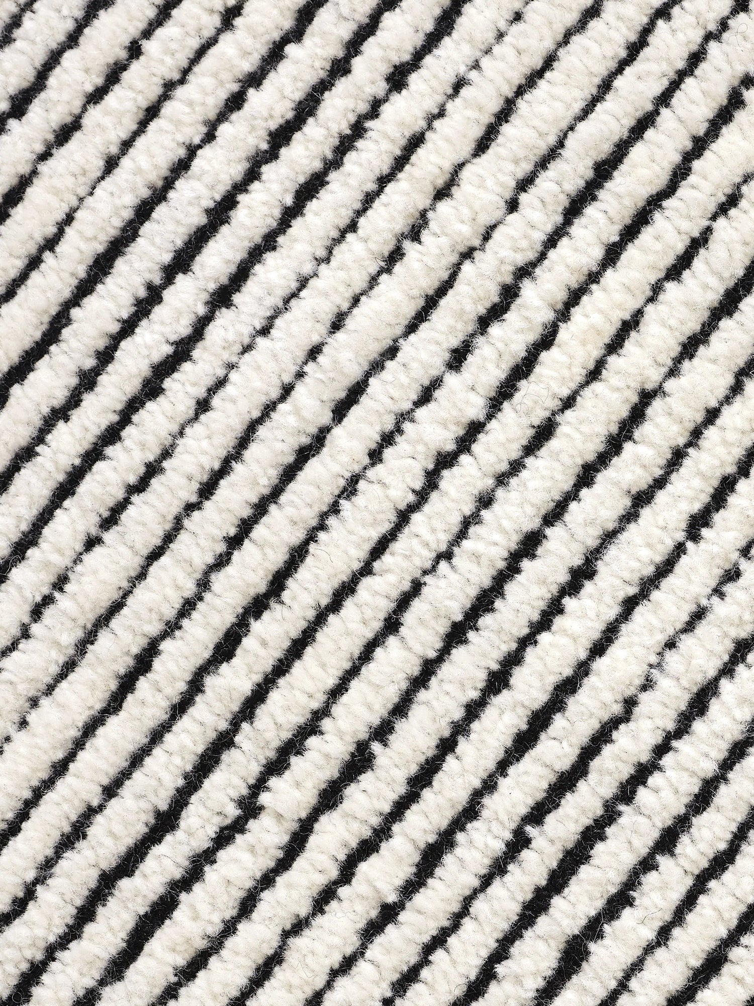 Disc Rug Black White Design markanter Teppich mit kontrastreichem Farbdesign aus Wolle und Baumwolle