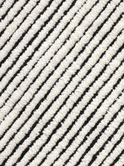 Disc Rug Black White Design markanter Teppich mit kontrastreichem Farbdesign aus Wolle und Baumwolle