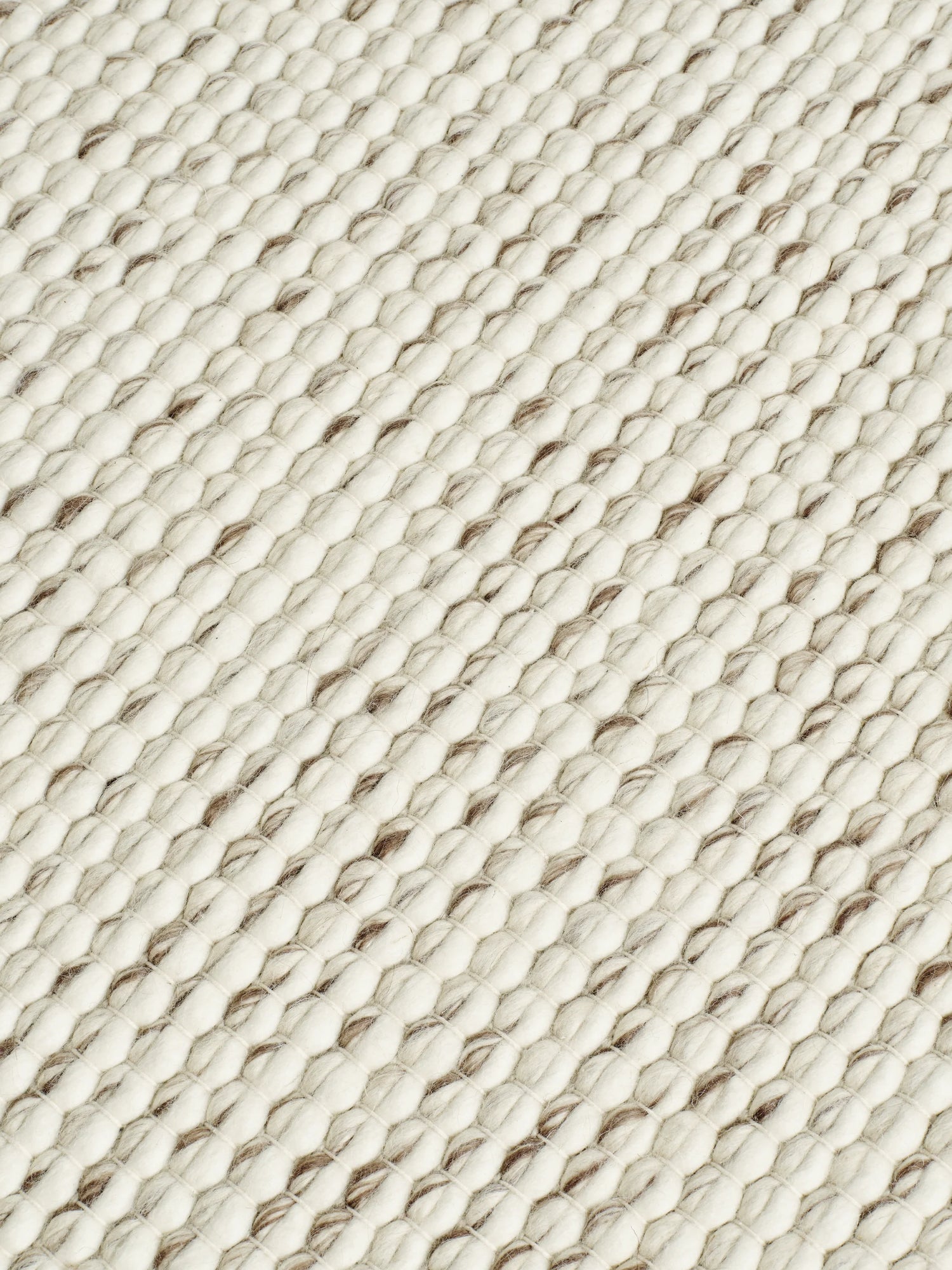 Loopy rug handwoven craftsmanship Detailaufnahme von handgewebter Verarbeitung aus Nordindien von Tom Dixon