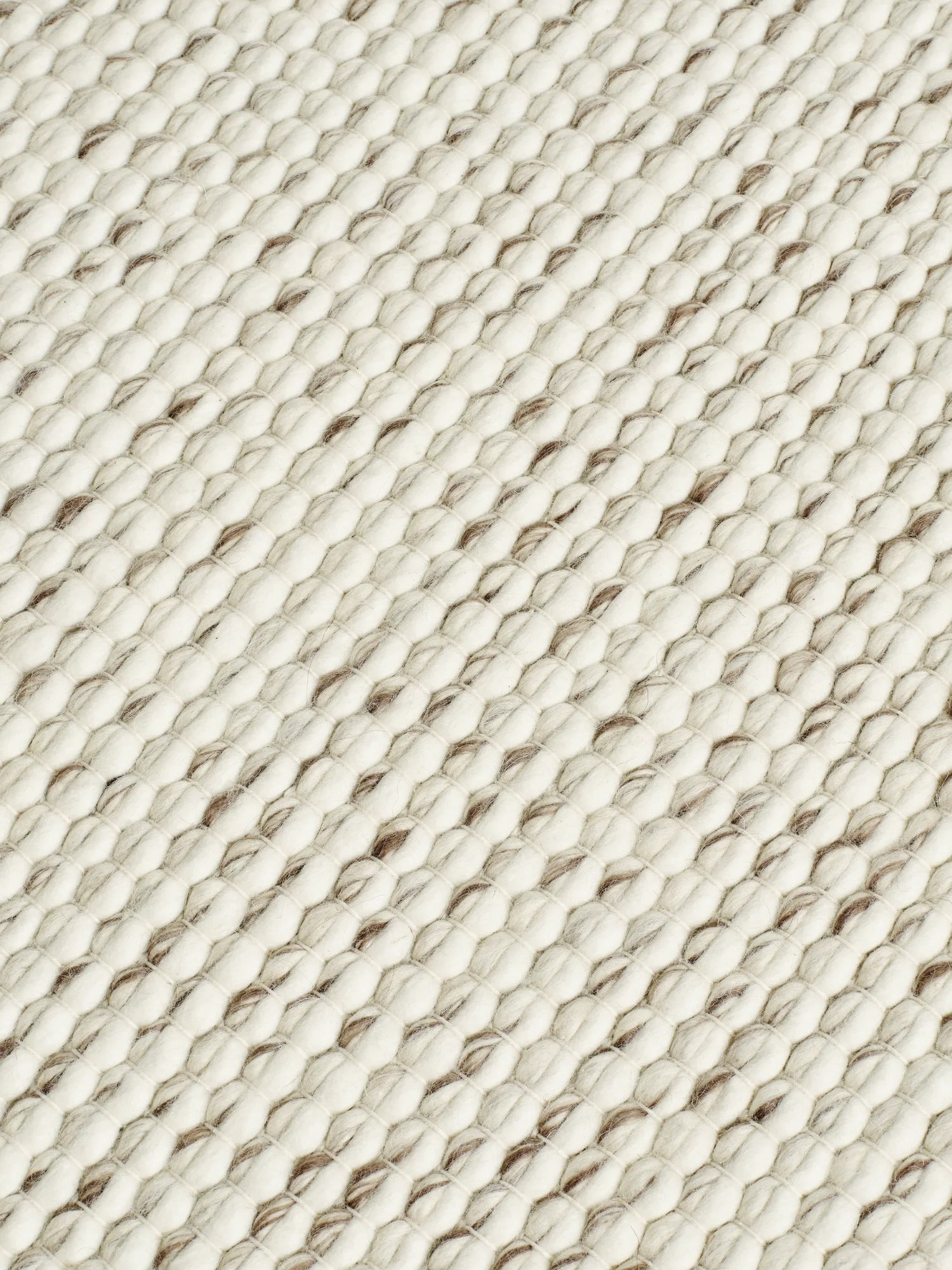 Loopy rug handwoven craftsmanship Detailaufnahme von handgewebter Verarbeitung aus Nordindien von Tom Dixon