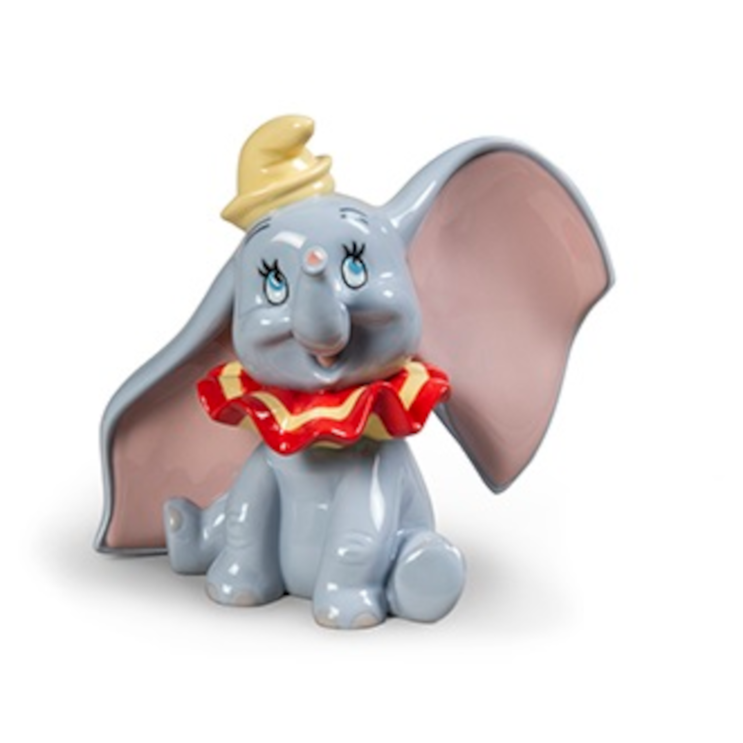 Hochwertige Porzellanfigur von Dumbo mit großen Ohren und fröhlichem Ausdruck.
