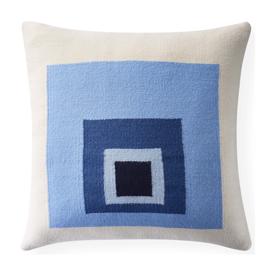 Blaues Dekokissen mit grafischem Design von Jonathan Adler.