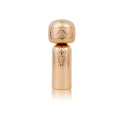Glänzende Kokeshi-Figur in Roségold im Stil von Karl Lagerfeld