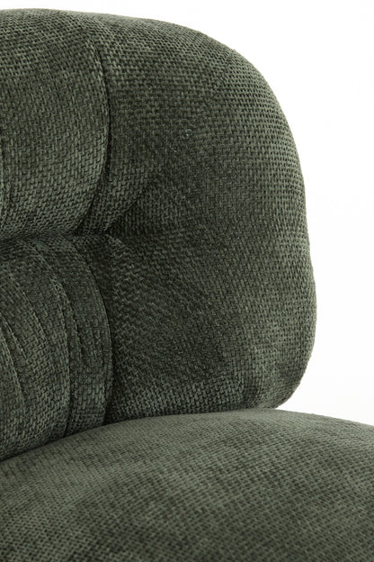 Moderner Polstersessel in Grün mit klarer Linienführung