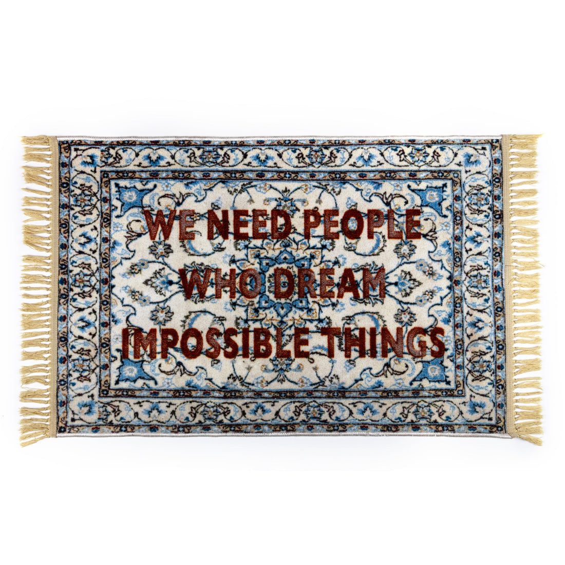 Designerteppich von Seletti mit inspirierendem Schriftzug in Blau und Beige