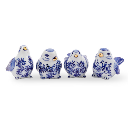 Geschenkset aus vier handverzierten Porzellanfiguren von Pols Potten