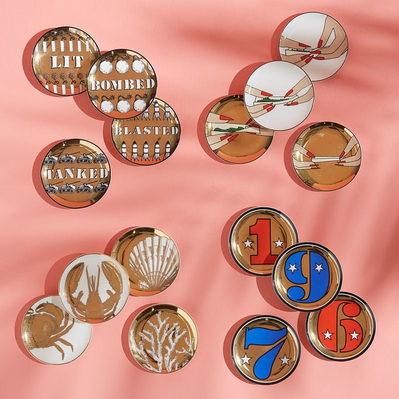 Runde Untersetzer aus Porzellan mit edlen Goldakzenten